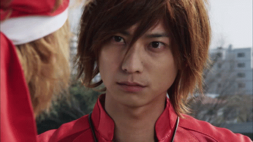 Close Up of Man With Red Jacket