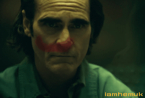 Close Up Of Man With Red Paint Saying Iamhermuk GIF