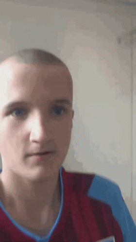 Close Up of Man With Shaved Head
