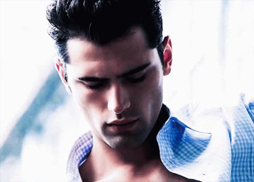 Close Up Of Man With Shirt Open GIF