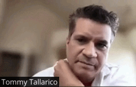 Close Up of Man With Tommy Tallarico Written Below