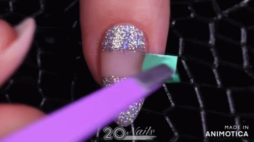 Close Up Of Nails With Purple Light GIF