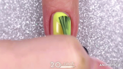 Close Up of Nails with Yellow and Black Polish