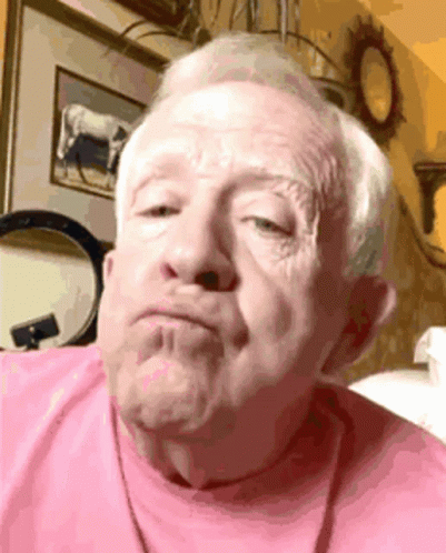 Close Up Of Older Man In Blue Shirt GIF