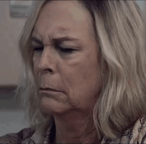 Close Up Of Older Woman's Wrinkled Face GIF
