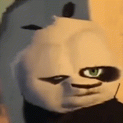 Close Up of Panda Bear Face With Green Eye and Black Nose