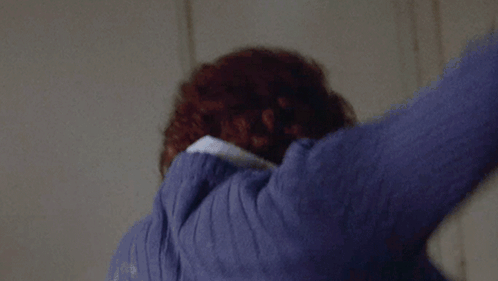 Close Up of Person in Blue Sweater