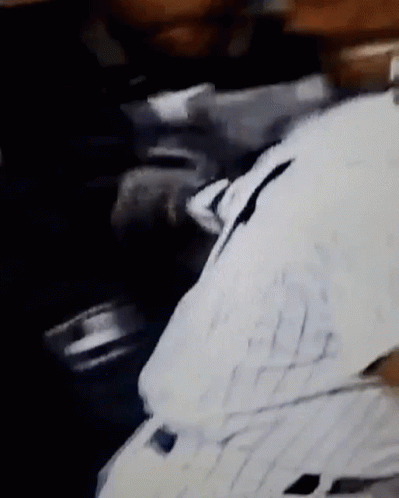 Close Up of Person in White Shirt