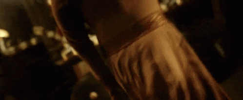 Close Up of Person's Arm in Dark Room