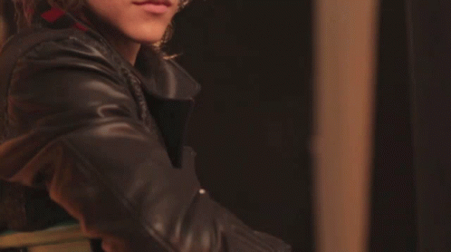 Close Up of Person's Face in Black Leather Jacket