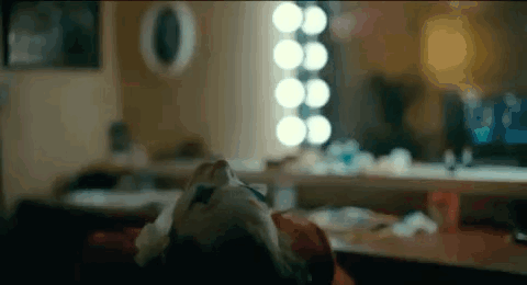 Close Up Of Person's Face In Dressing Room GIF