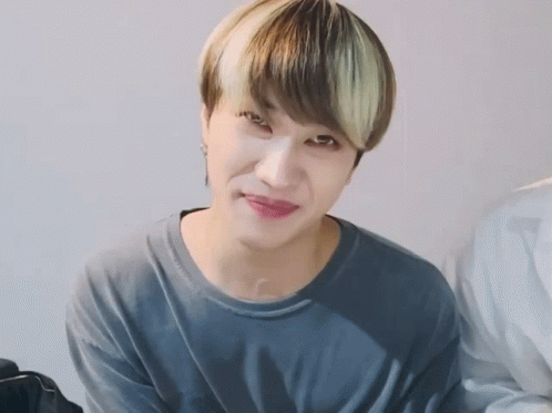 Close Up Of Person's Face In Gray Shirt GIF