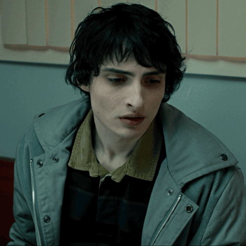 Close Up of Person's Face in Grey Jacket