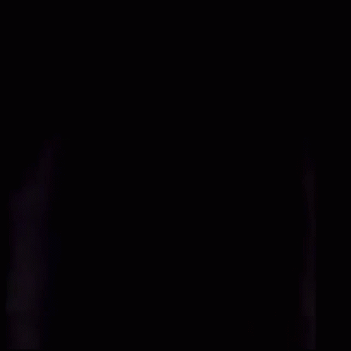 Close Up Of Person's Face With Red Eyes GIF