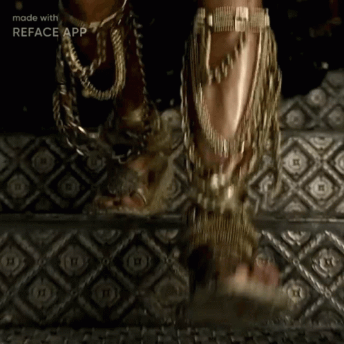 Close Up Of Person's Feet With Reface App Watermark GIF