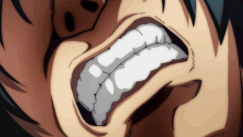 Close Up Of Person's Mouth With Large White Teeth GIF