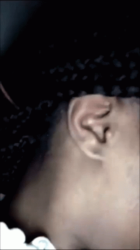 Close Up of Person's Neck and Ear