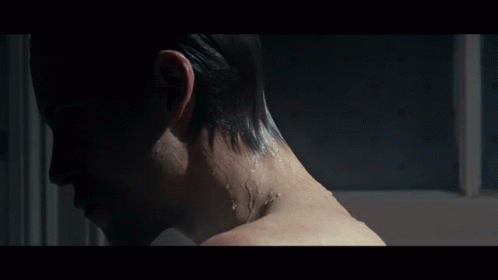 Close Up Of Person's Neck And Shoulder GIF
