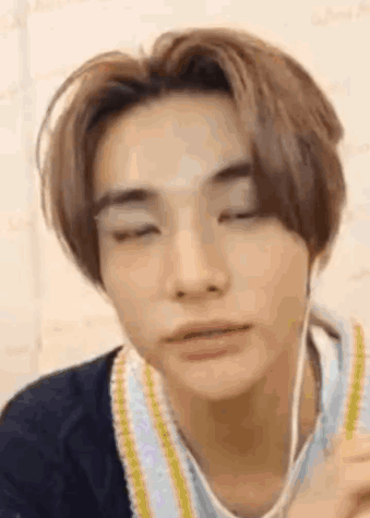 Close Up Of Person Wearing Headphones GIF