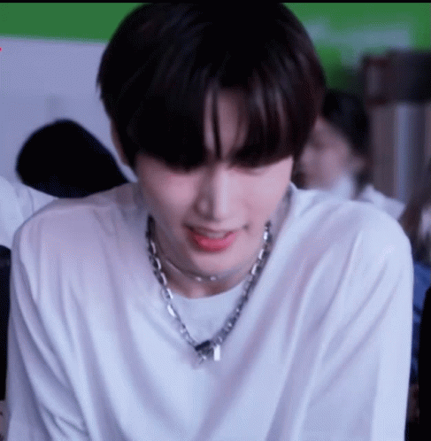 Close Up Of Person Wearing Necklace GIF