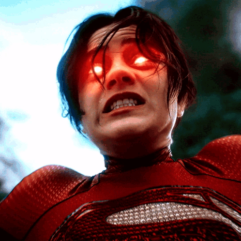 Close-Up Of Person With Bright Red Eyes GIF