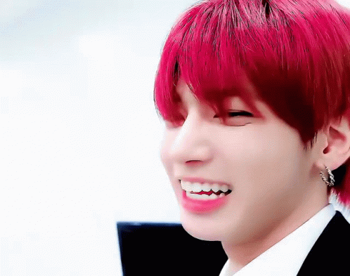 Close-Up of Person With Red Hair and Teeth