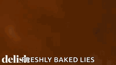 Close Up Of Pie In Glass Dish Saying Delifreshly Baked Lies GIF