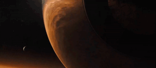 Close Up of Planet With Crescent Moon