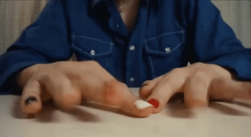 Close Up of Red and White Nails