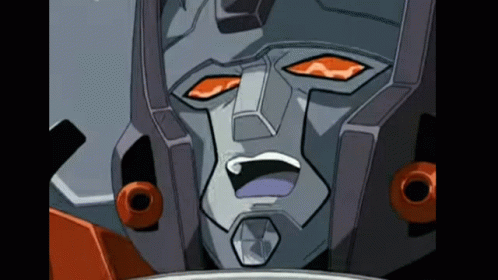 Close Up of Robot Face With Orange Eyes