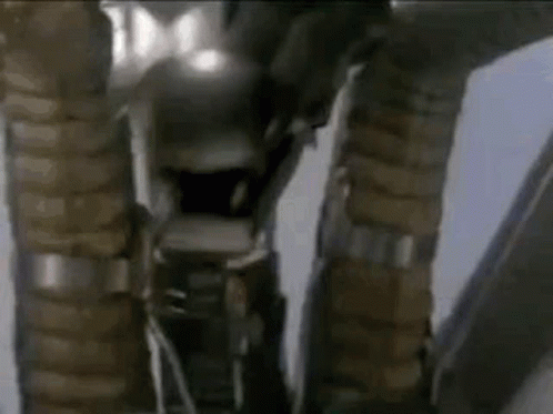Close Up of Robot Legs and Arms in Room