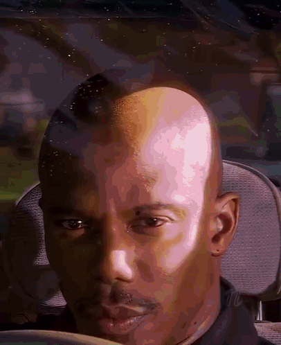Close Up of Shaved Head Man