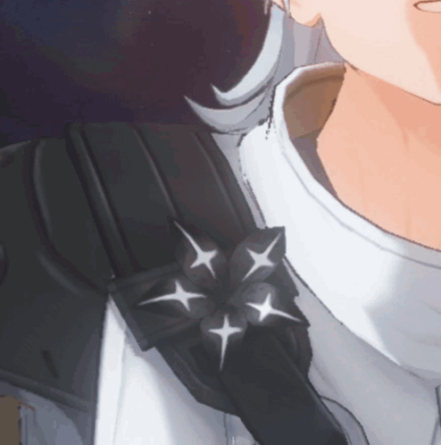Close-Up of Shoulder With Black Flower and White Stars