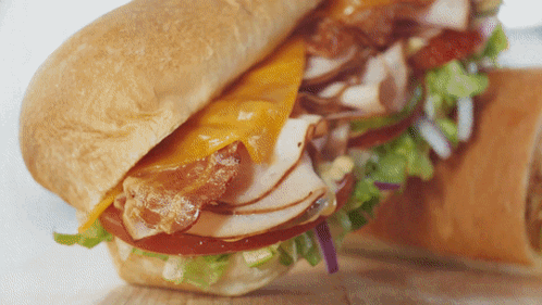 Close Up Of Turkey Bacon Lettuce Sandwich GIF