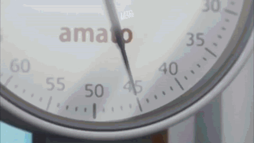 Close-Up of Watch Face Saying Amao