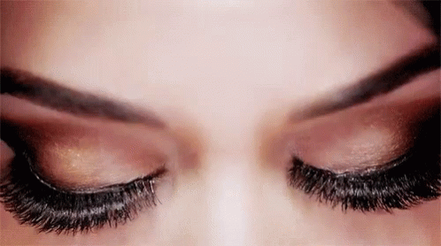 Close Up Of Woman Eyes With Long Eyelashes And Eyeshadow GIF