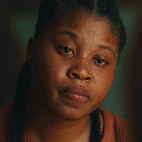 Close Up Of Woman Face With Braids GIF