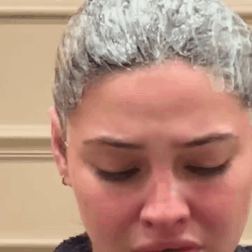Close Up Of Woman Face With Hair Dye GIF