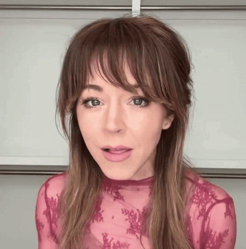 Close Up Of Woman In Pink Top GIF
