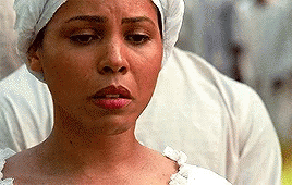 Close Up Of Woman In White Head Scarf GIF