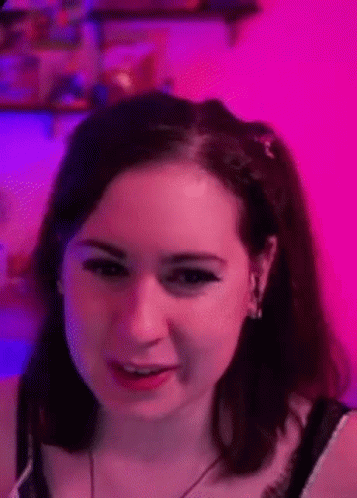 Close Up of Woman's Face on Pink Background