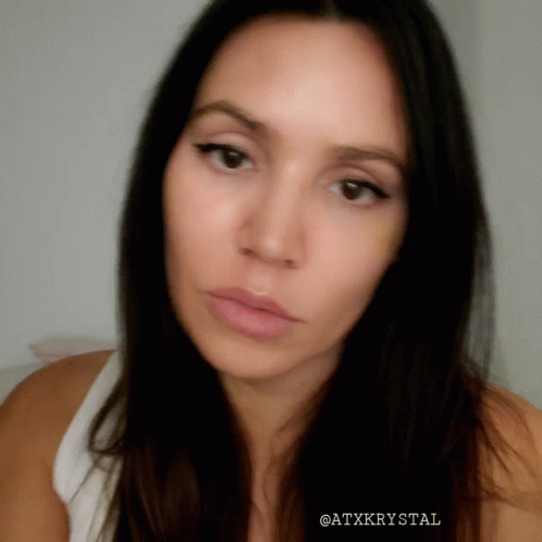 Close Up of Woman's Face with @atxkystal