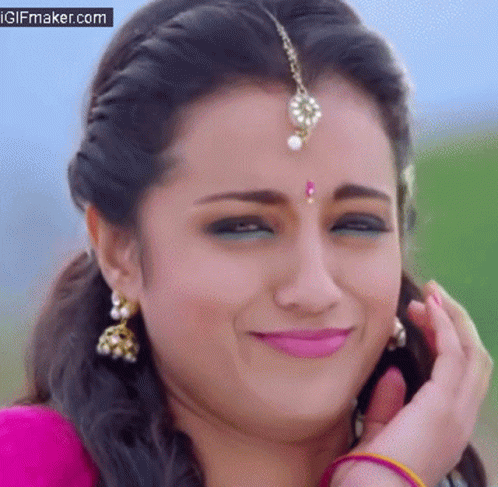 Close Up of Woman's Face with Bindi and Earrings