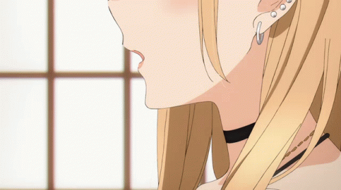 Close Up of Woman's Face With Earrings