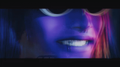 Close Up of Woman's Face With Purple Hair
