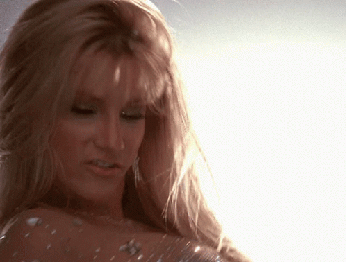 Close Up of Woman's Face With Sun Shining Through Hair