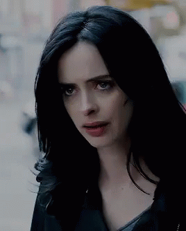 Close Up of Woman With Black Hair and Serious Look