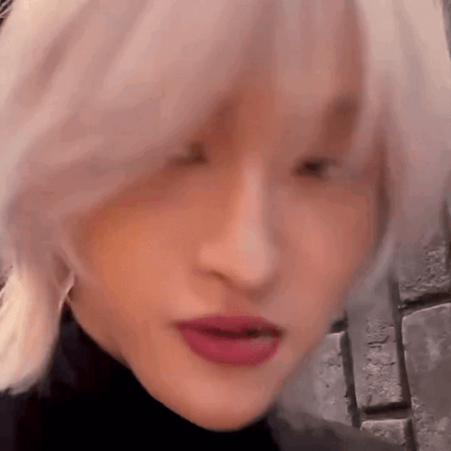 Close Up of Woman with Blonde Hair and Red Lips