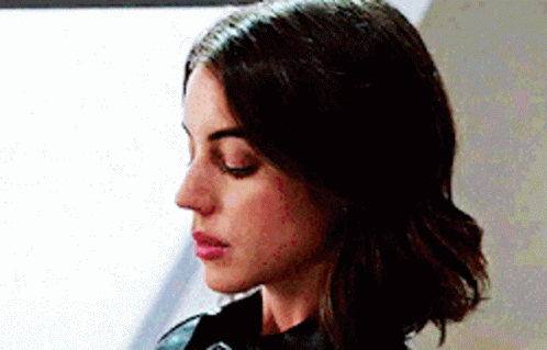 Close Up Of Woman With Eyes Closed And Black Jacket GIF