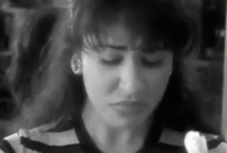 Close Up of Woman With Eyes Closed Black and White